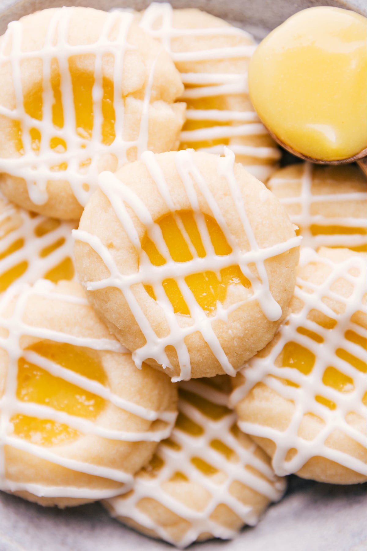 The Best Lemon Curd Cookies Recipe Soft, buttery cookies filled with tangy lemon curd and topped with a light glaze.