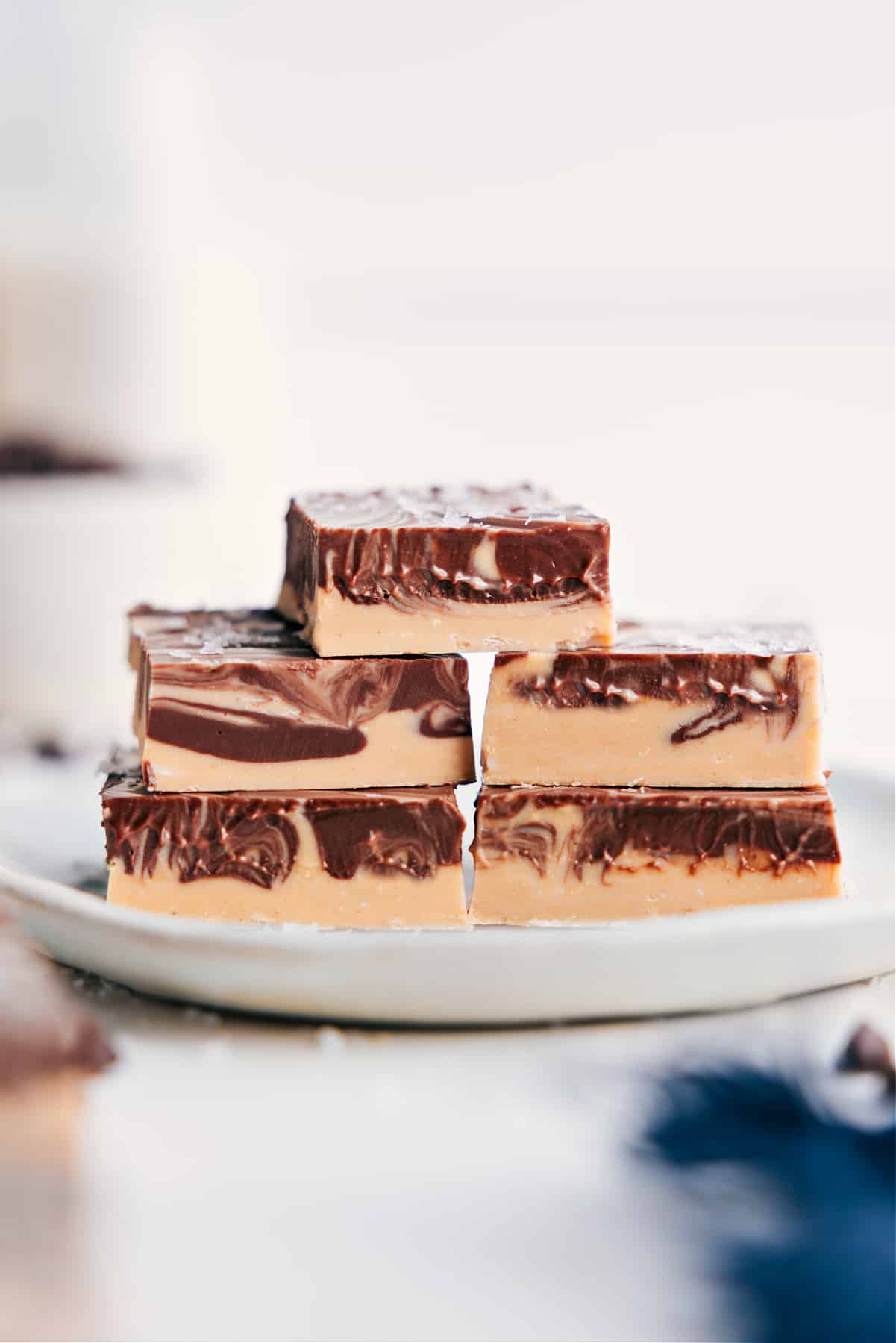 Decadent Tiger Butter Fudge Stacks Tiger Butter Fudge stacked on top of each other.