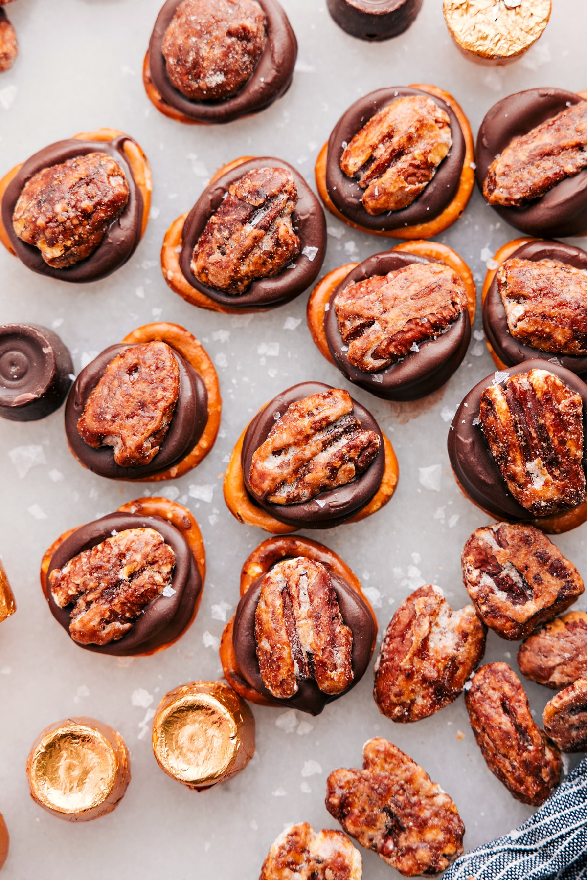 The Best Turtle Candy Recipe Simple 3-ingredient Rolo Pretzel Turtles with flaky sea salt on top.