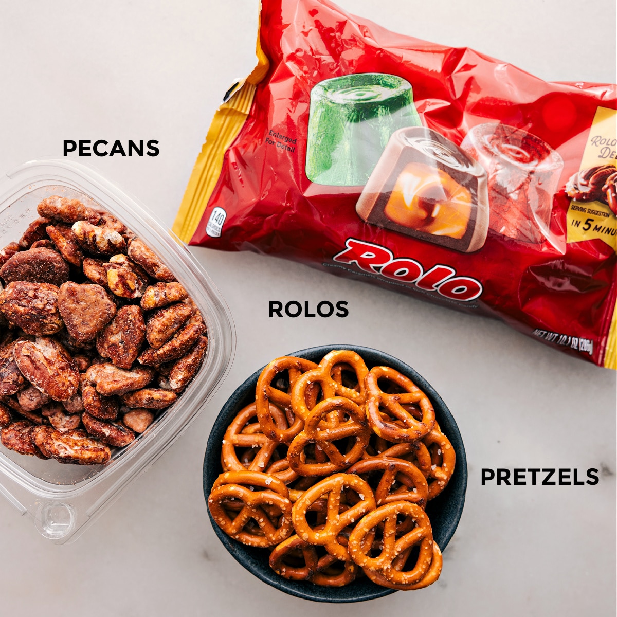Ingredients In Turtle Candy This recipe uses just 3 ingredientsโRolos, pretzels, and pecansโall prepped for easy assembly!