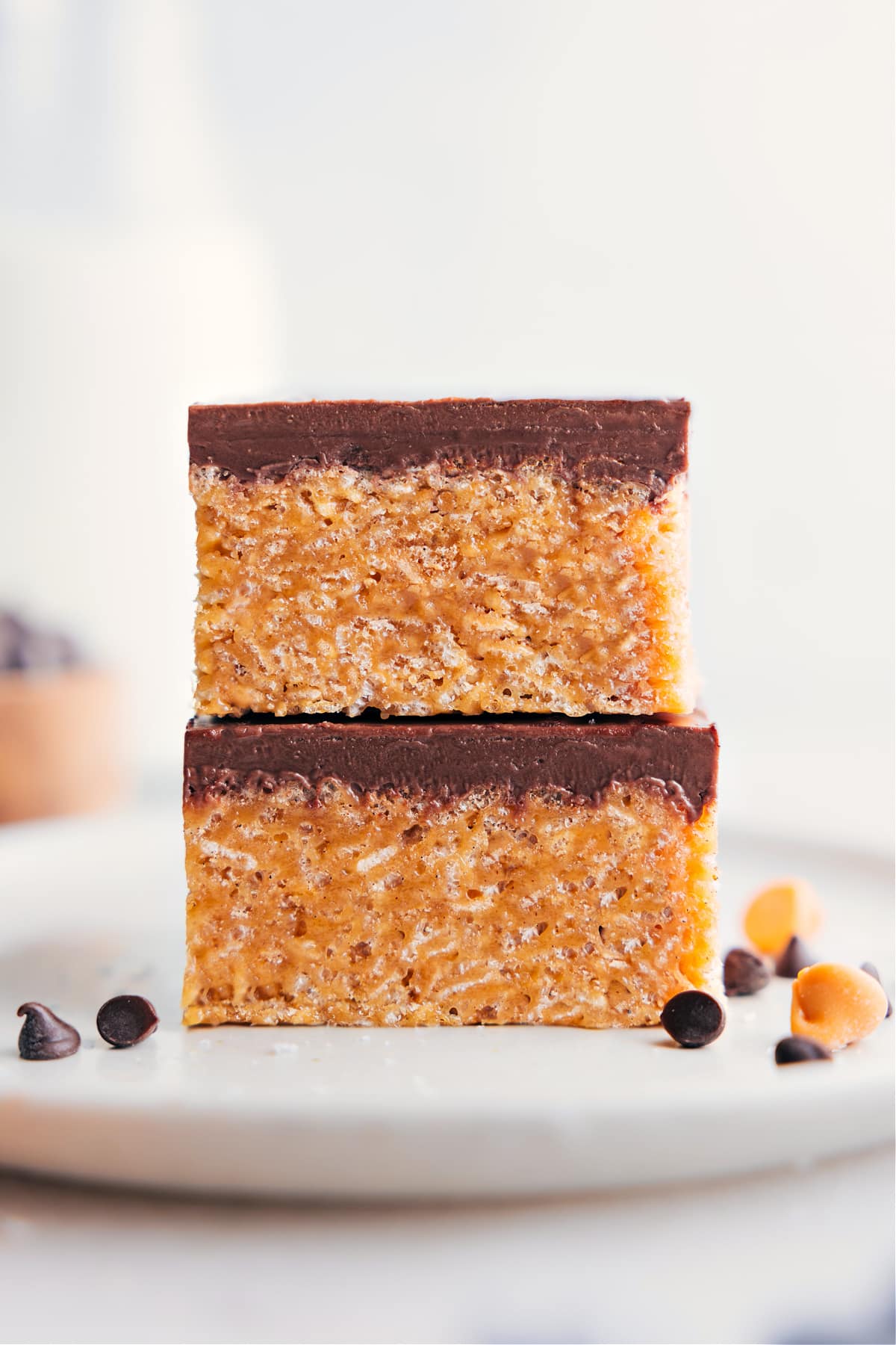 The Best Scotcheroos Recipe Two Scotcheroos bars stacked on top of each other.