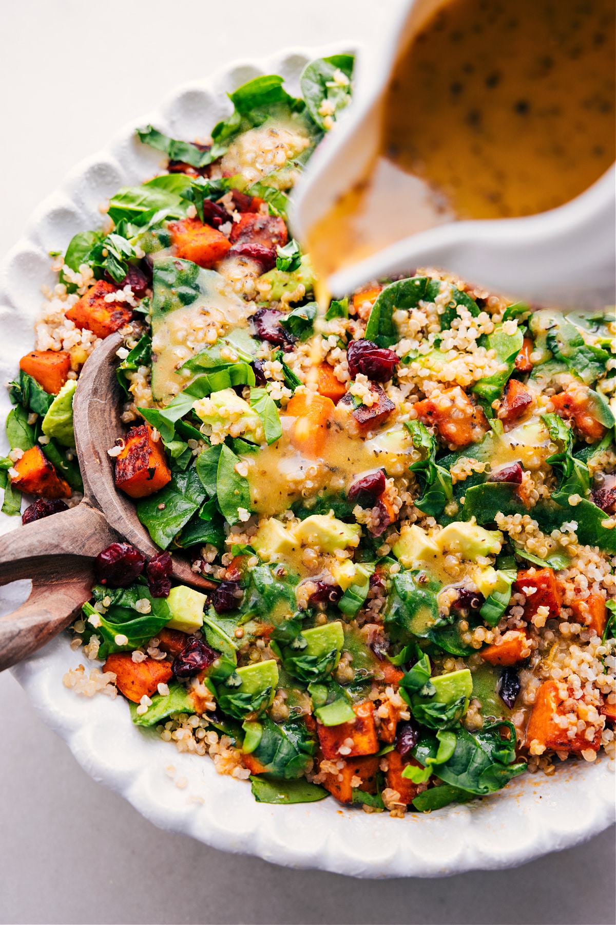 Dress Sweet Potato Quinoa Salad Recipe The dressing poured over the dish.