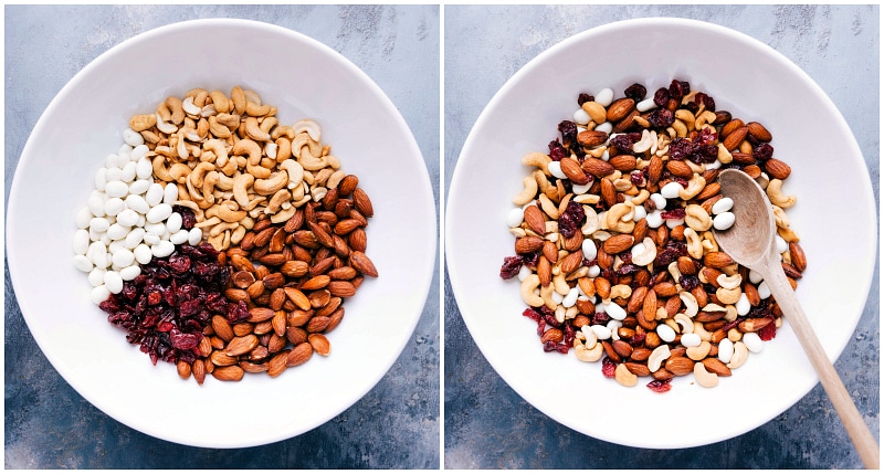 Assembling Healthy Trail Mix with Nuts, Seeds, and Dried Fruit Ingredients for a healthy trail mix, such as walnuts, pecans, dried cherries, pistachios, pepitas, sunflower seeds, cocoa-roasted almonds, and coconut chips, being combined.