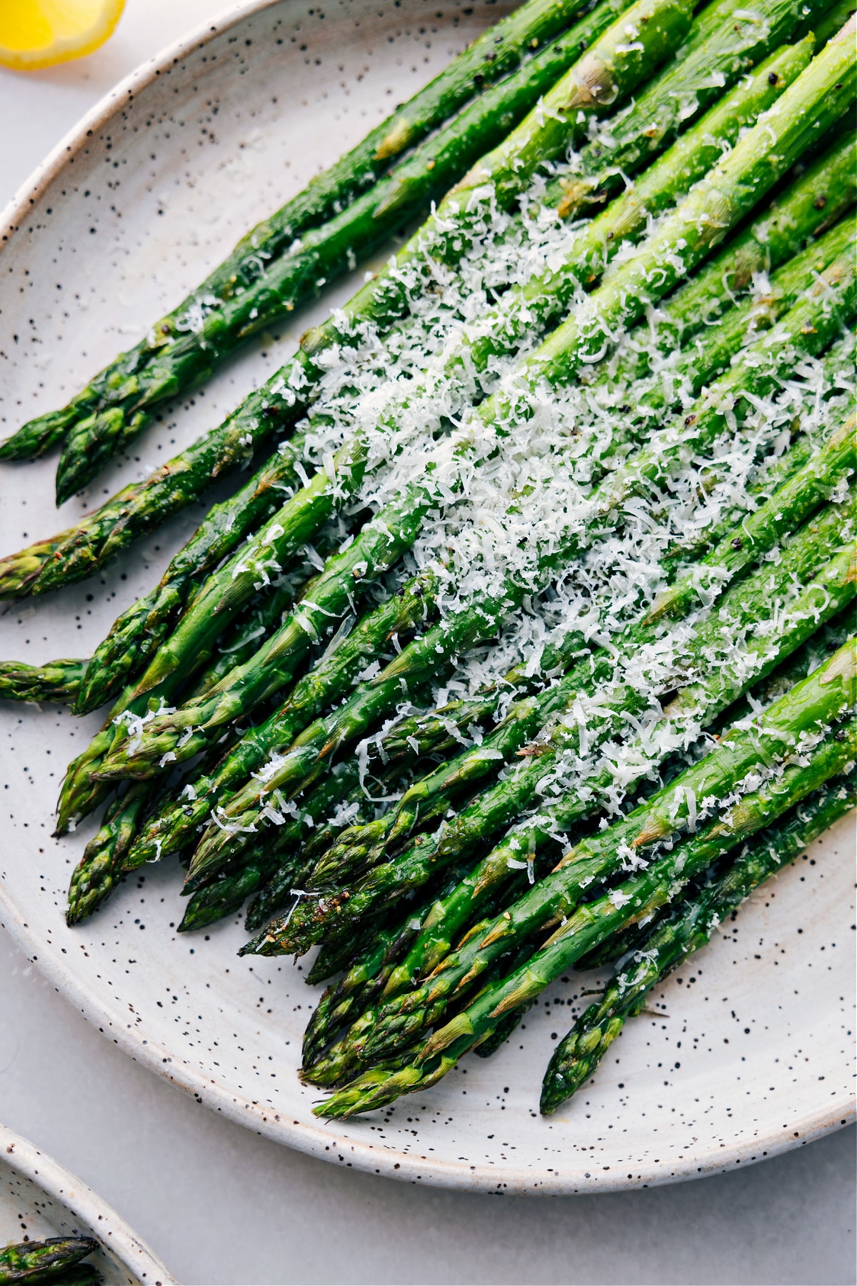 The roasted asparagus recipe on a plate ready to be served.