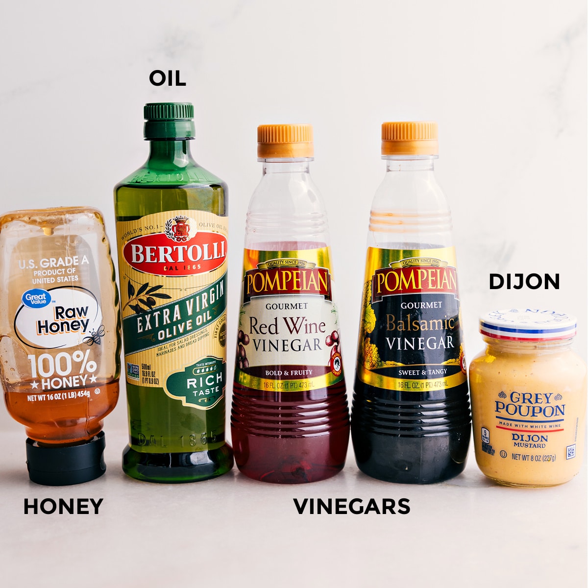 Dressing Ingredients For Panzanella All the dressing ingredients for this panzanella salad are prepped, including honey, oil, red wine vinegar, balsamic vinegar, and Dijon.