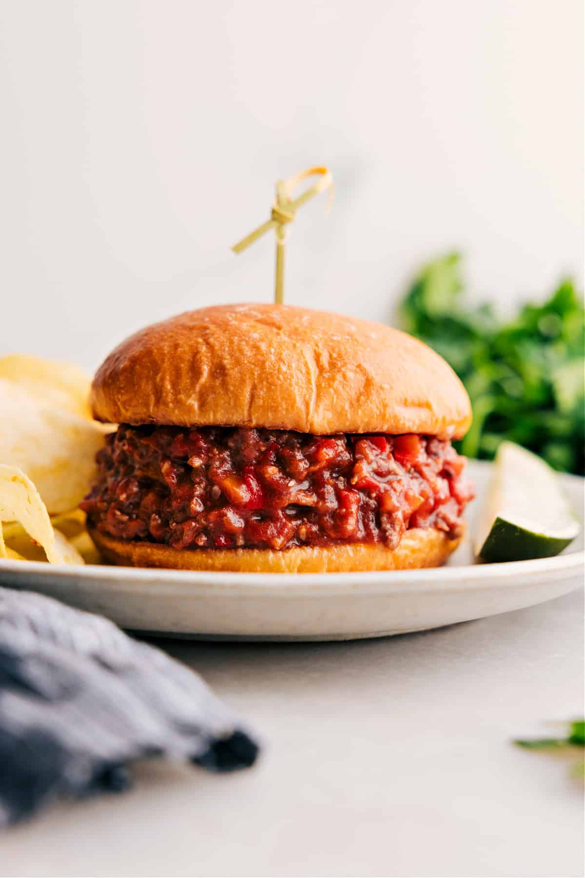 Sloppy Joes recipe piled into a bun and ready to enjoy.