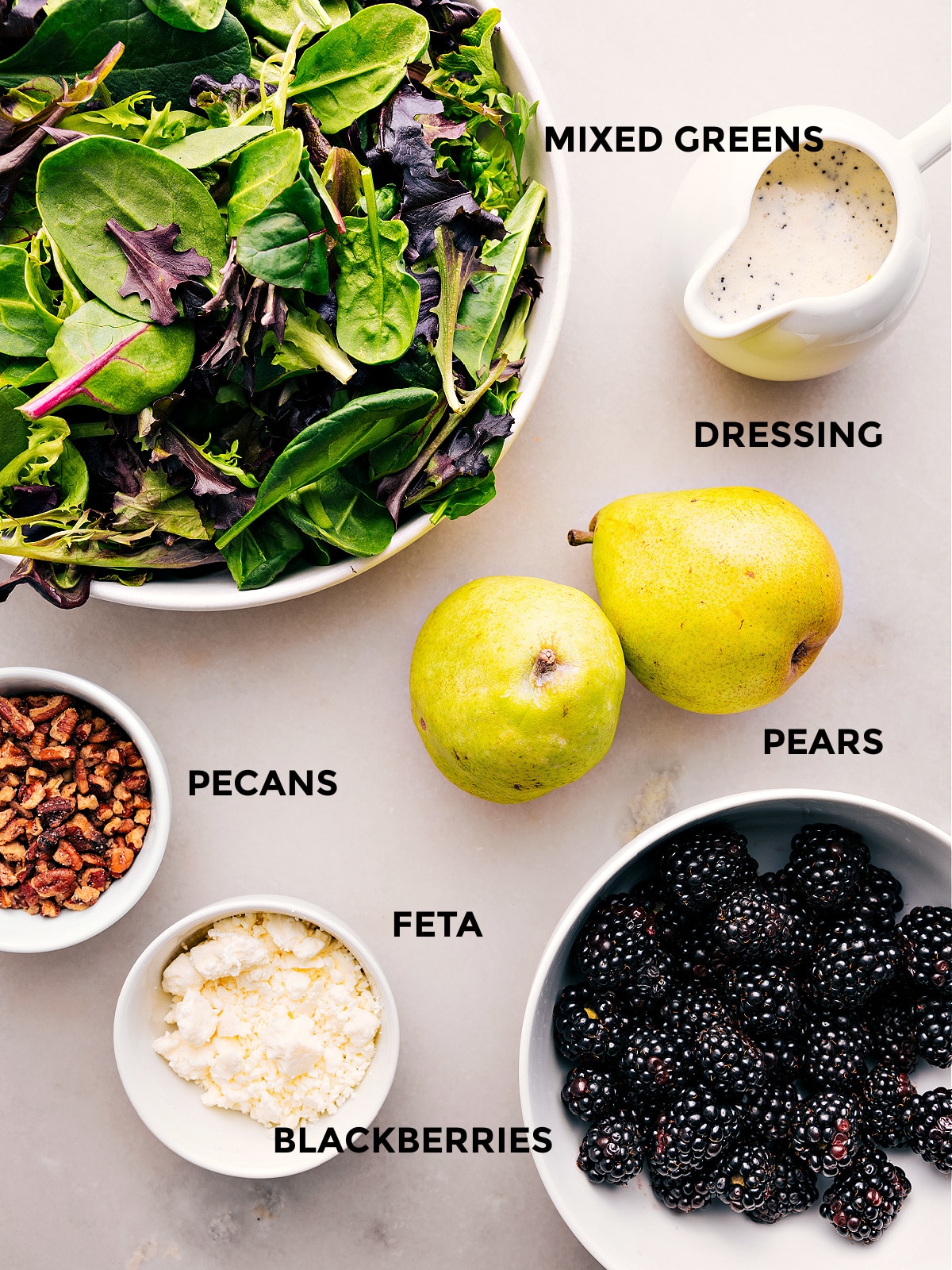 Ingredients In Blackberry Salad All the ingredients in this recipe are prepped for easy assembly, including the dressing, greens, pears, blackberries, feta, and pecans.