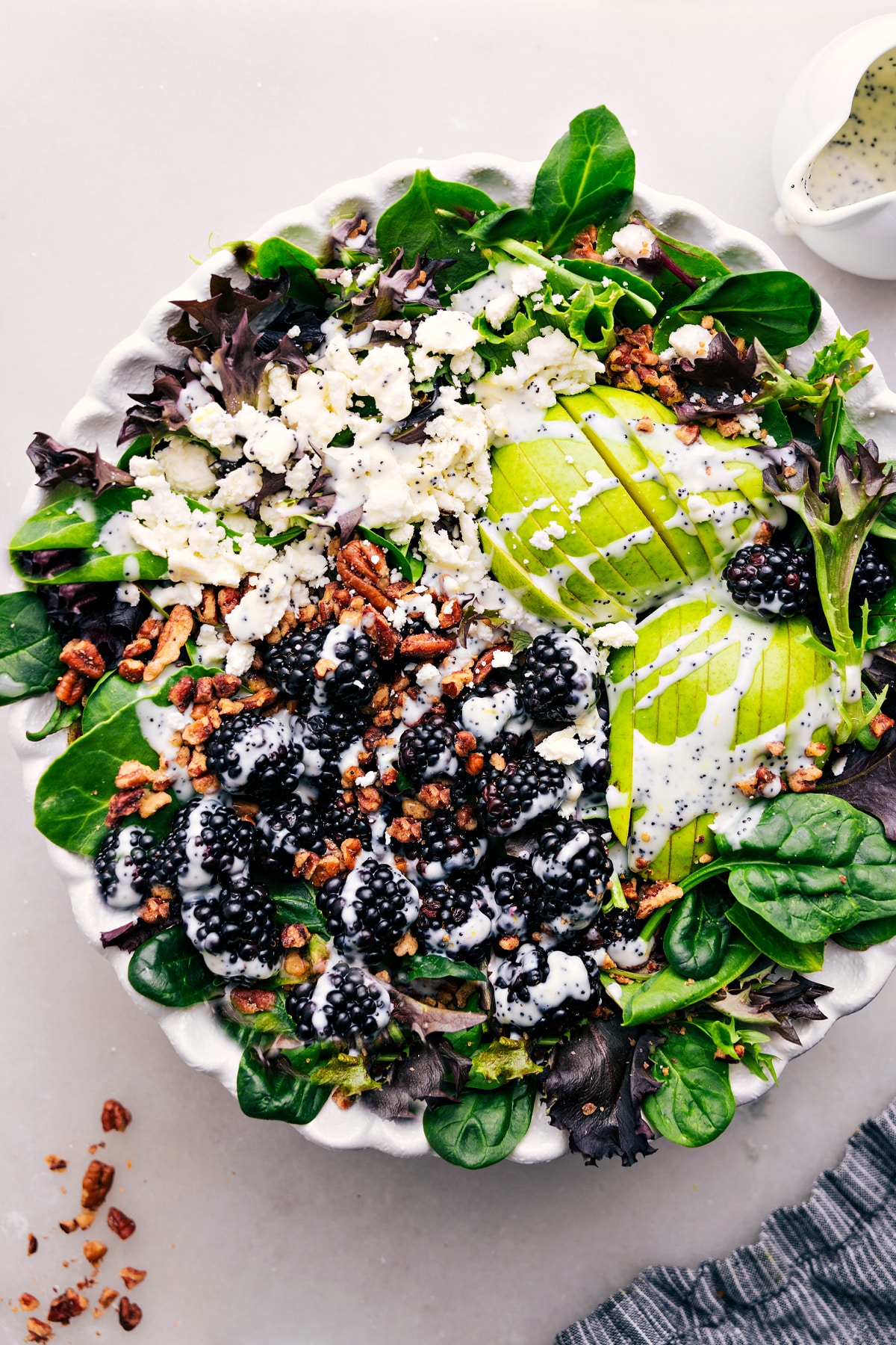 The Best Blackberry Salad Recipe Blackberry Salad with poppyseed dressing in a bowl.