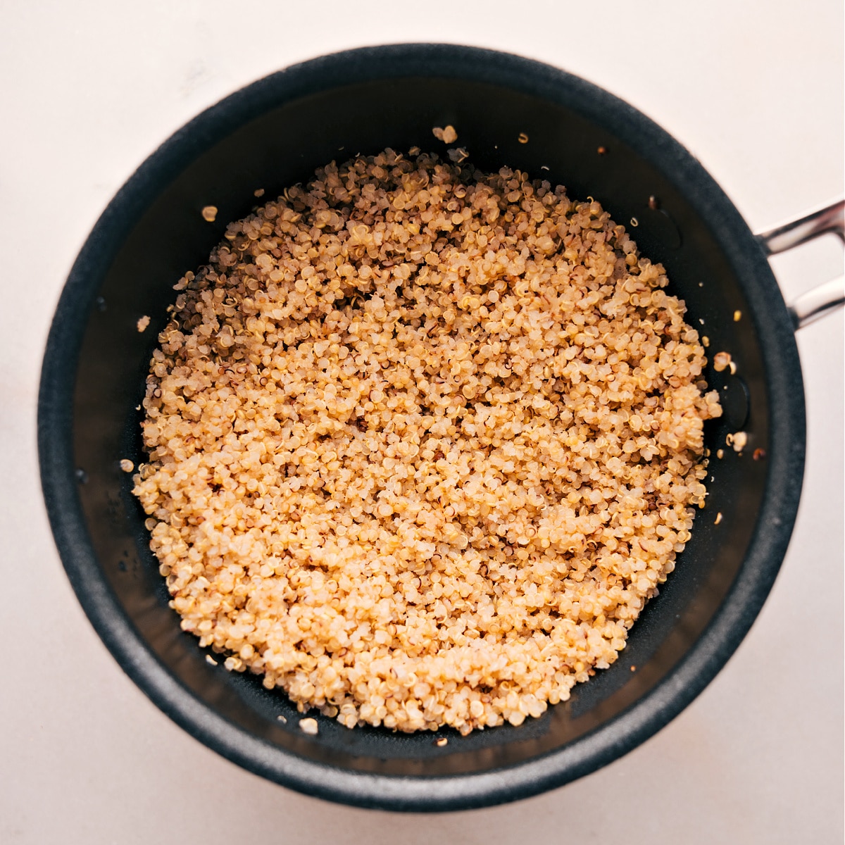 Quinoa Base For Buddha Bowls Quinoa cooked in a pot for these Buddha bowls.