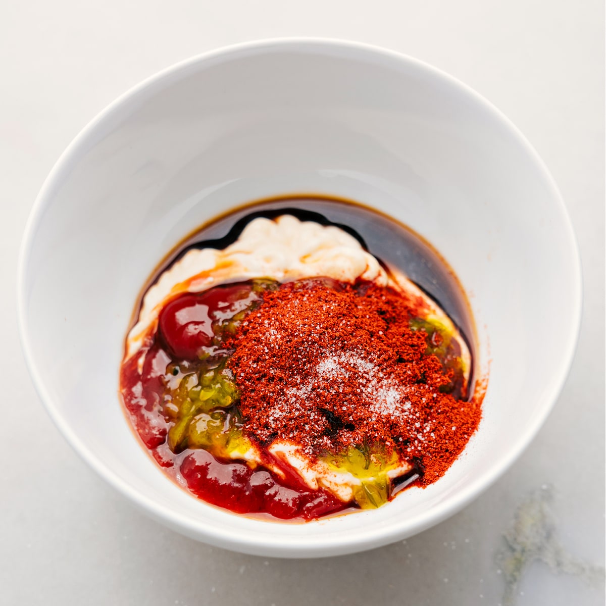 How To Make Fry Sauce All the ingredients in this recipe in a bowl ready to be mixed together.