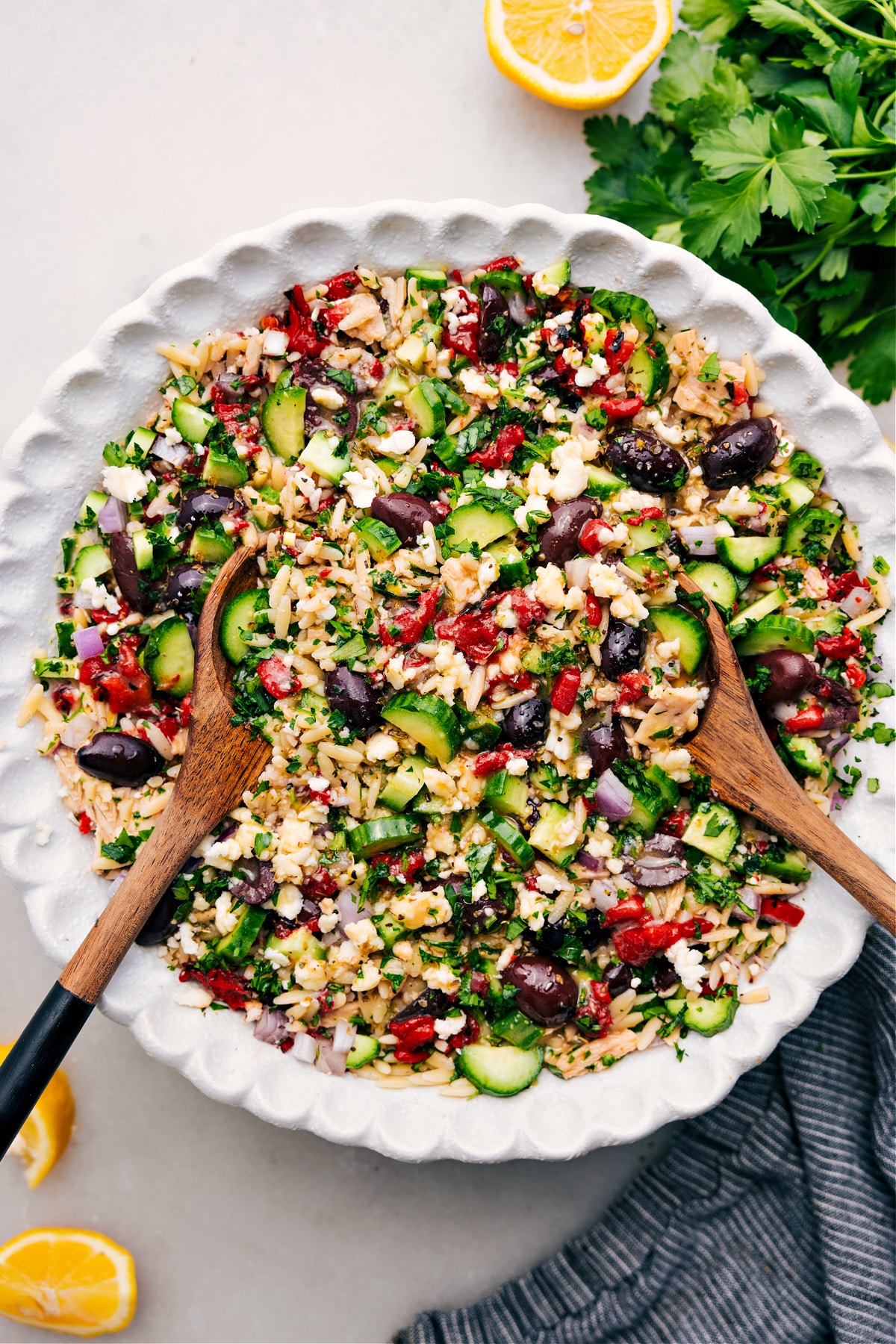 The Best Mediterranean Tuna Salad Mediterranean Tuna Salad tossed and dressed in a bowl.