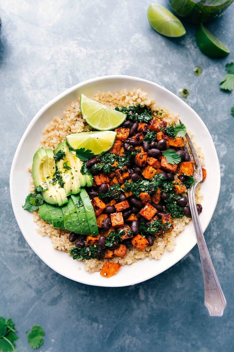 Deliciously Vibrant Sweet Potato Buddha Bowl - Colorful and Ready for a Healthy Meal Colorful sweet potato buddha bowl, dressed and bursting with vibrant ingredients, ready to enjoy.