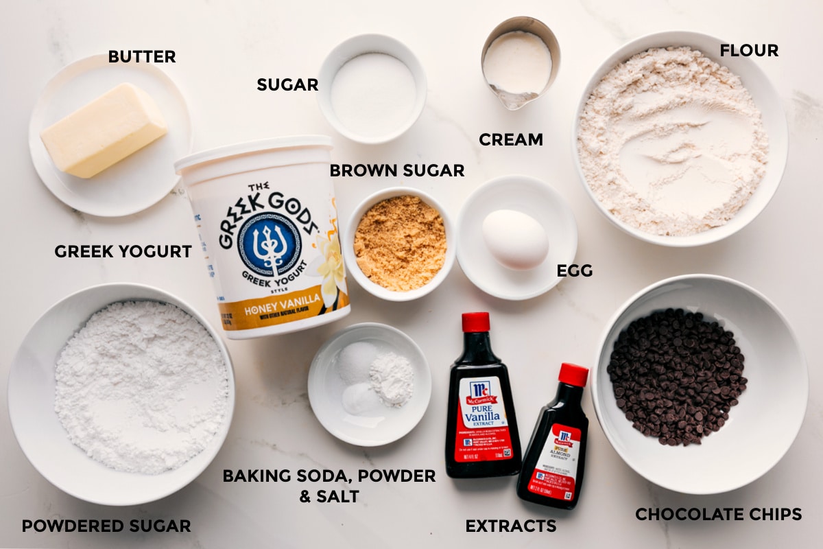 Ingredients In Chocolate Chip Scones All the ingredients for this recipe prepped and ready for easy assembly, including butter, powdered sugar, white sugar, brown sugar, yogurt, baking agents, cream, egg, extracts, and chocolate chips.