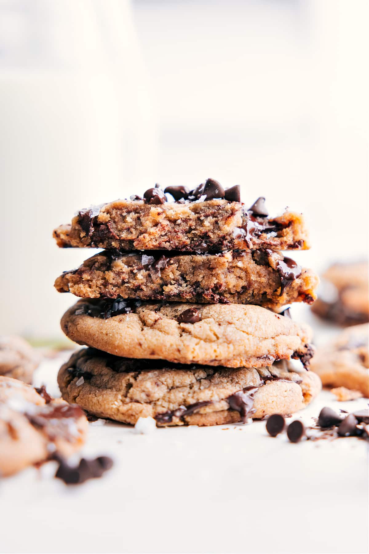 Homemade Small Batch Chocolate Chip Cookies - Fresh from the Oven Small Batch Chocolate Chip Cookies stacked, with one broken open to show the soft, gooey center.