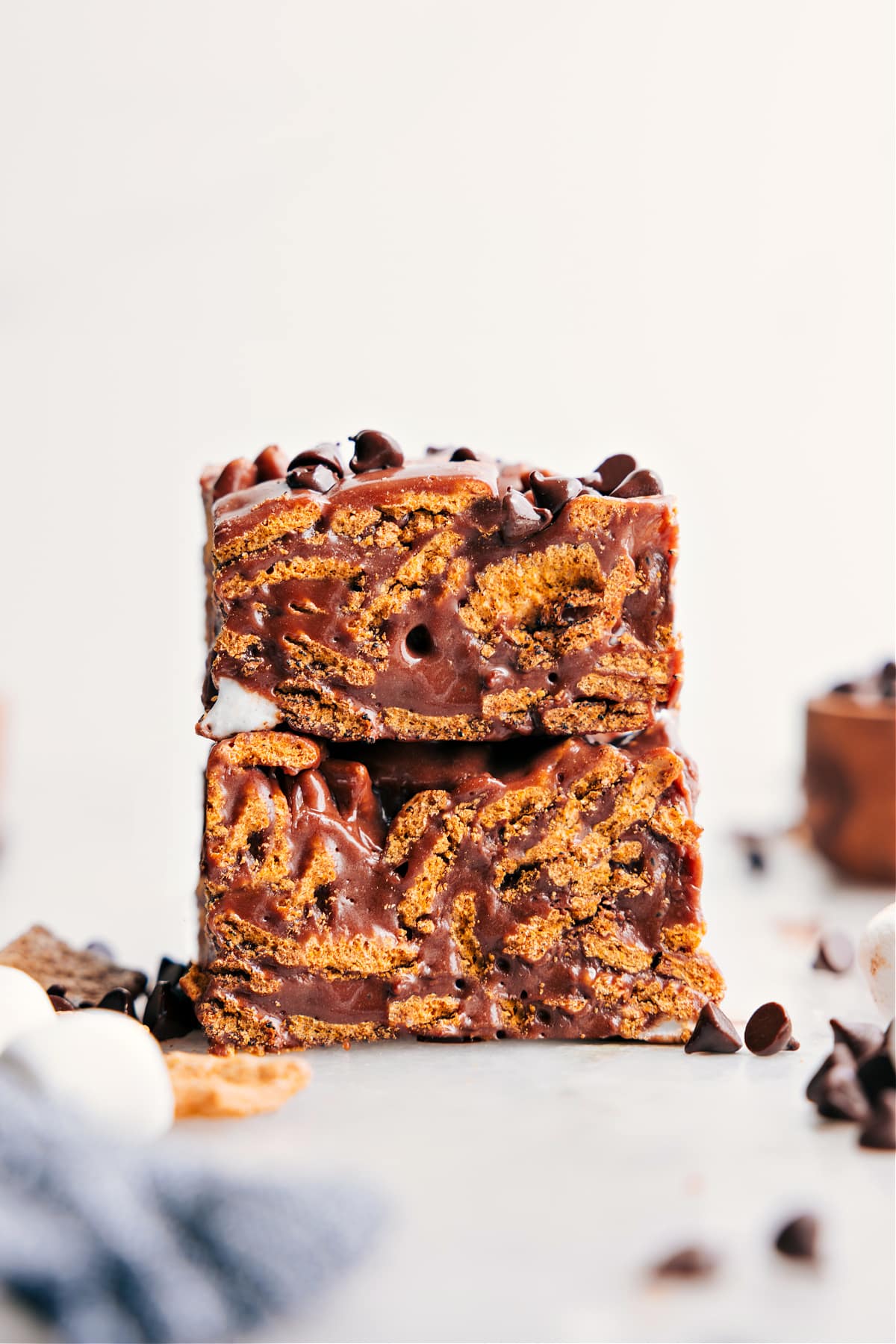 Indulgent S'mores Cereal Bars S'mores Cereal Bars piled high on top of each other.