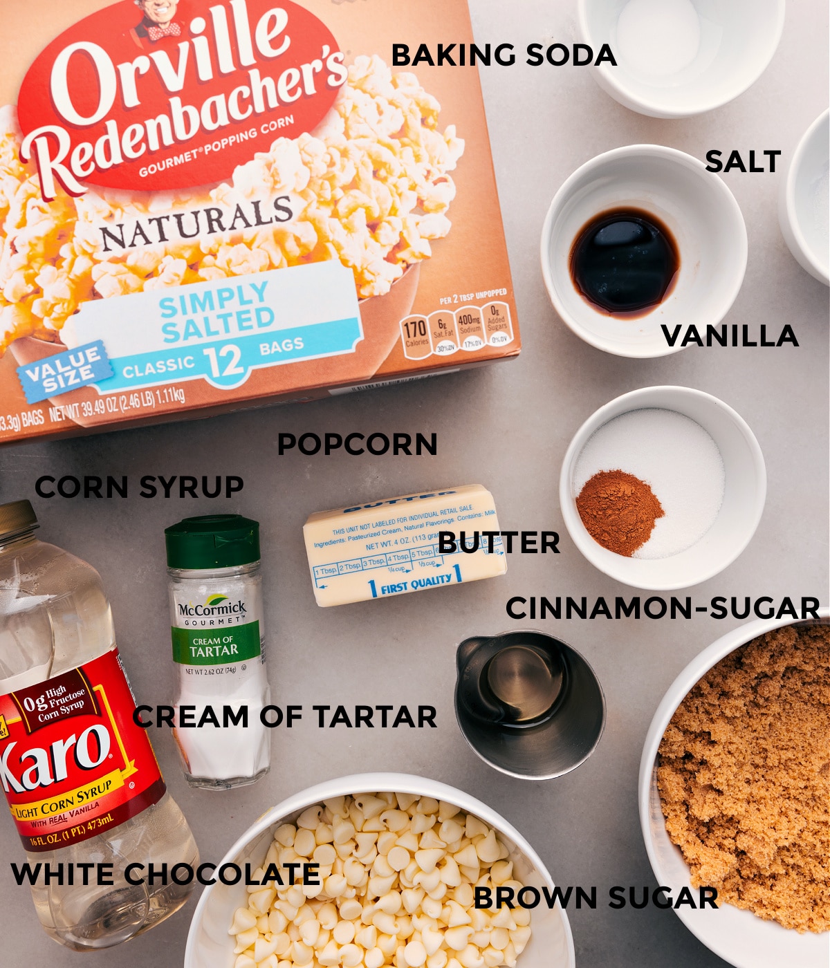 Ingredients In Cinnamon Roll Popcorn All the ingredients for this recipe are prepped and ready for easy assembly: popcorn, baking soda, salt, spices, cream of tartar, corn syrup, sugar, and chocolate.