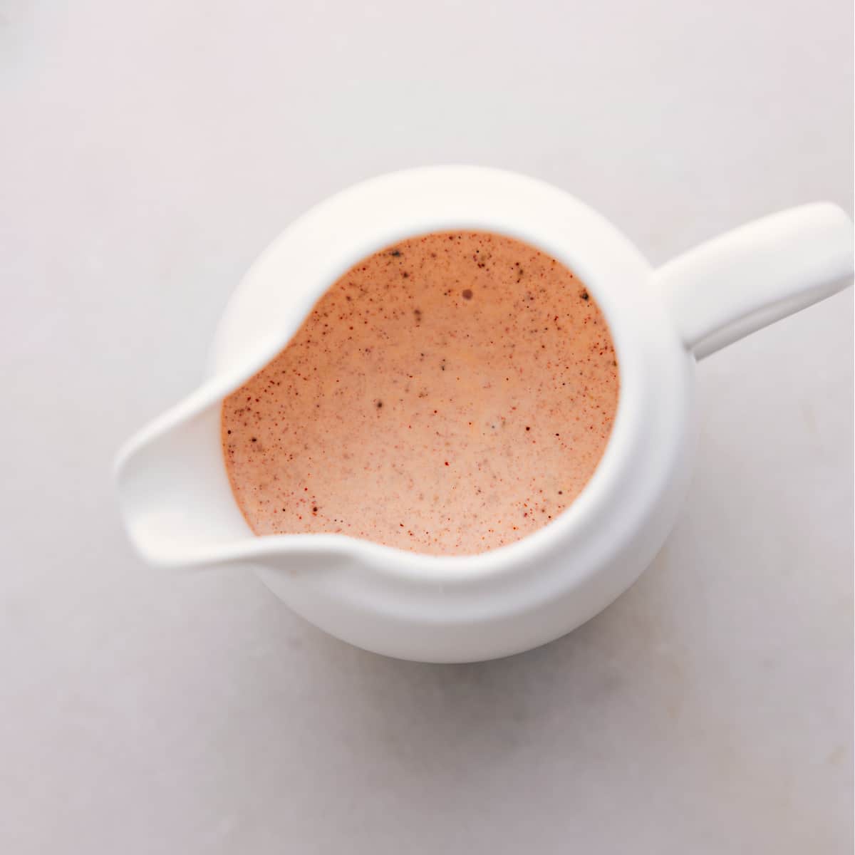 How To Make Mexican Street Corn Pasta Salad The sauce in a container to drizzle onto the salad.