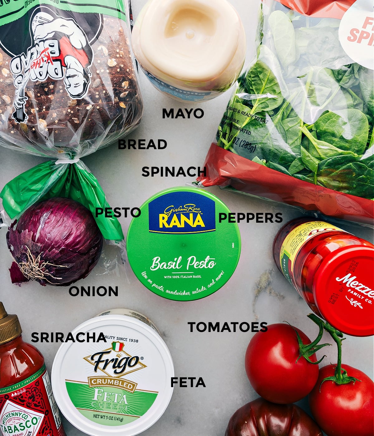 Ingredients In Mediterranean Pesto Sandwiches All the ingredients in this recipe prepped out for easy assembly.