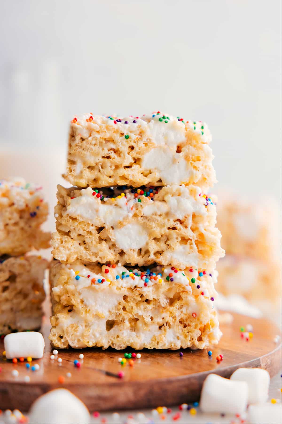 The Best Rice Krispie Treats Recipe Rice Krispie Treats squares stacked on top of each other showing the gooey and delicious texture.