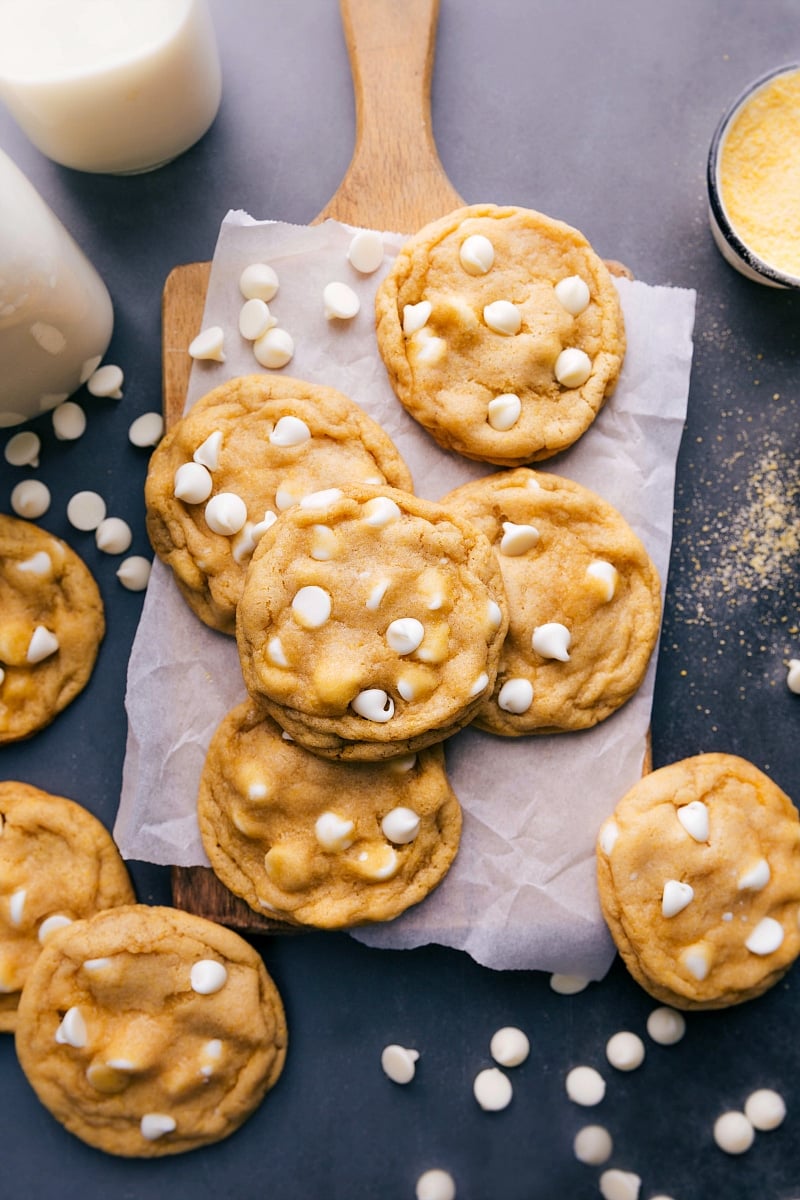 Batch of Finished Cornmeal Cookies with White Chocolate Chips A batch of freshly baked cornmeal cookies, each one topped with white chocolate chips, delicious and flavor-packed.