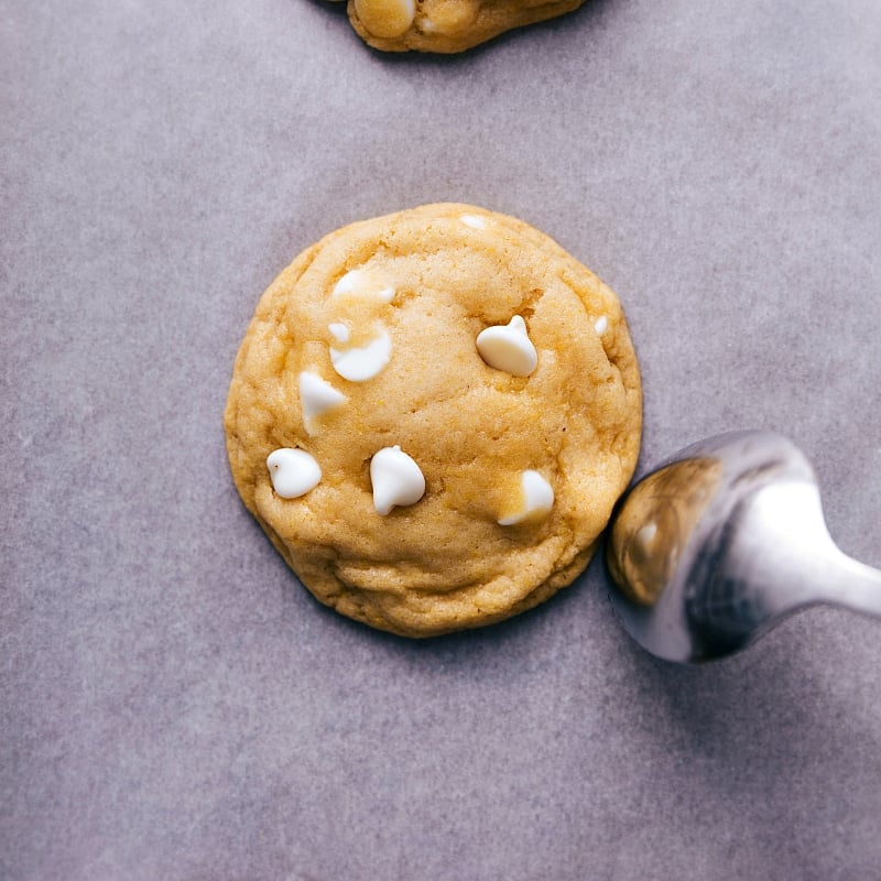 Freshly Baked Cornmeal Cookies A freshly baked cornmeal cookie, rounded by using the back of a spoon while still warm, ready to be enjoyed as a delicious treat.