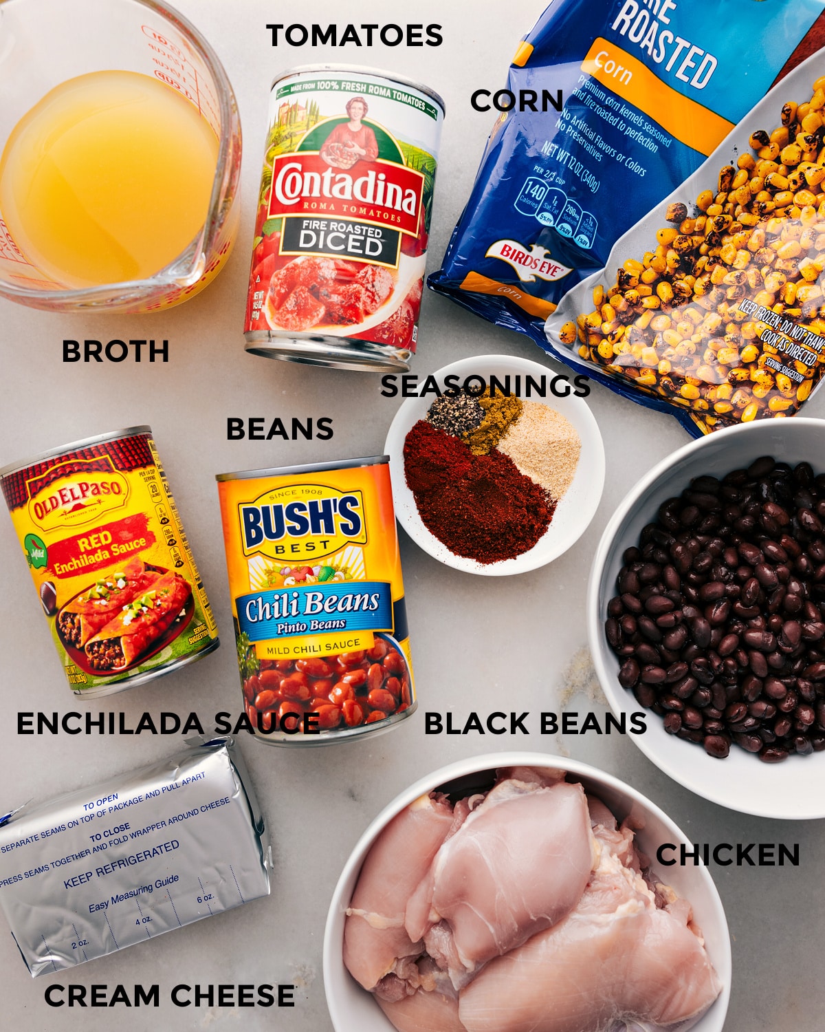 Ingredients In Crockpot Chicken Chili Prep all the ingredients for this recipe, including tomatoes, broth, beans, seasonings, corn, meat, enchilada sauce, and cream cheese, for easy assembly.