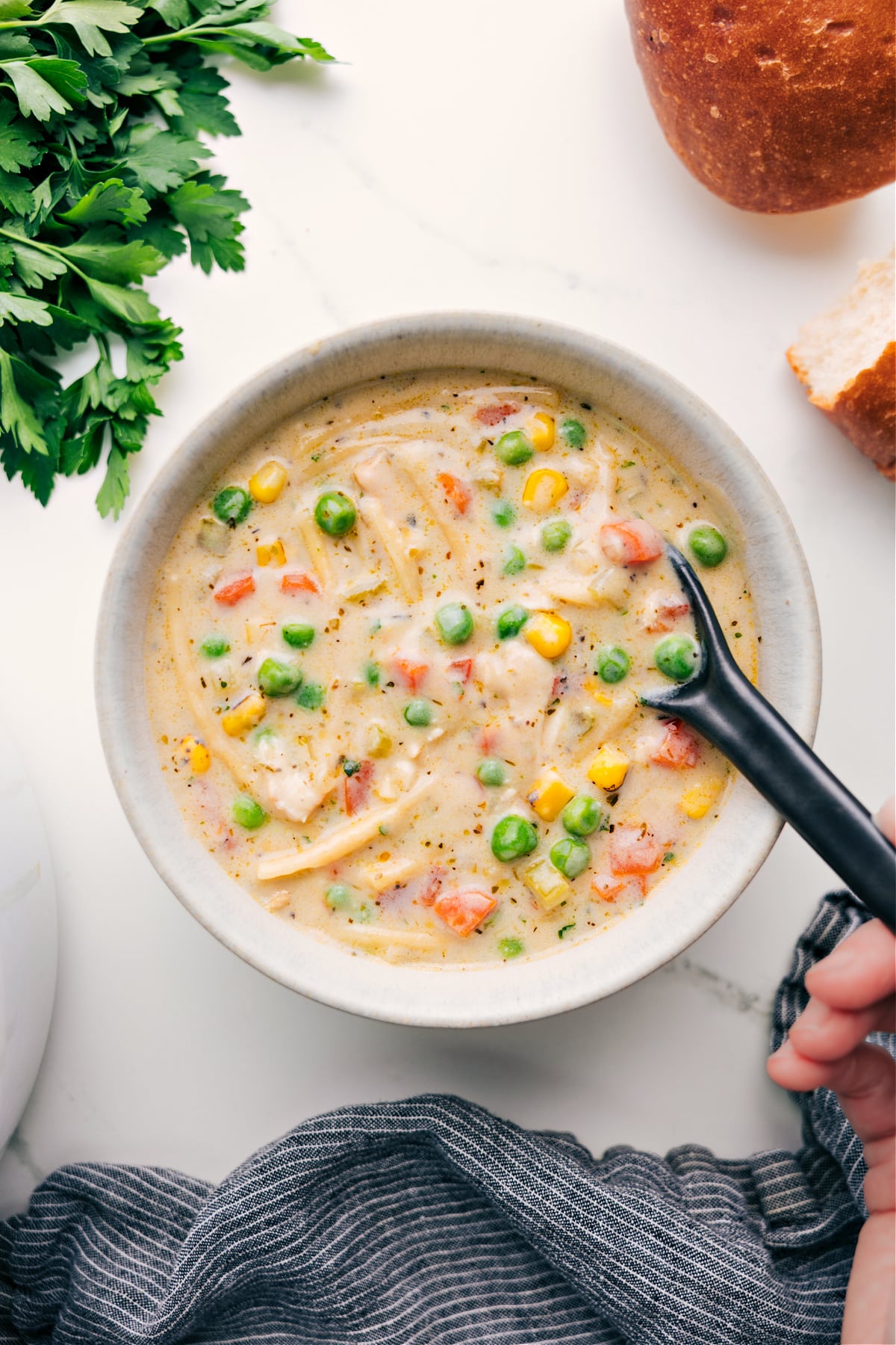 Creamy Chicken Noodle Soup in a bowl ready to be enjoyed.