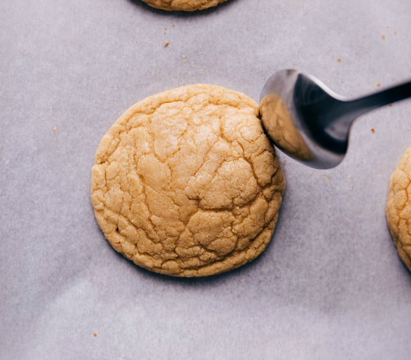 Shaping Cookies for Crispy Edges Using the back of a spoon to push in the edges of just-baked cookies, creating crispy edges while the cookies are still warm.
