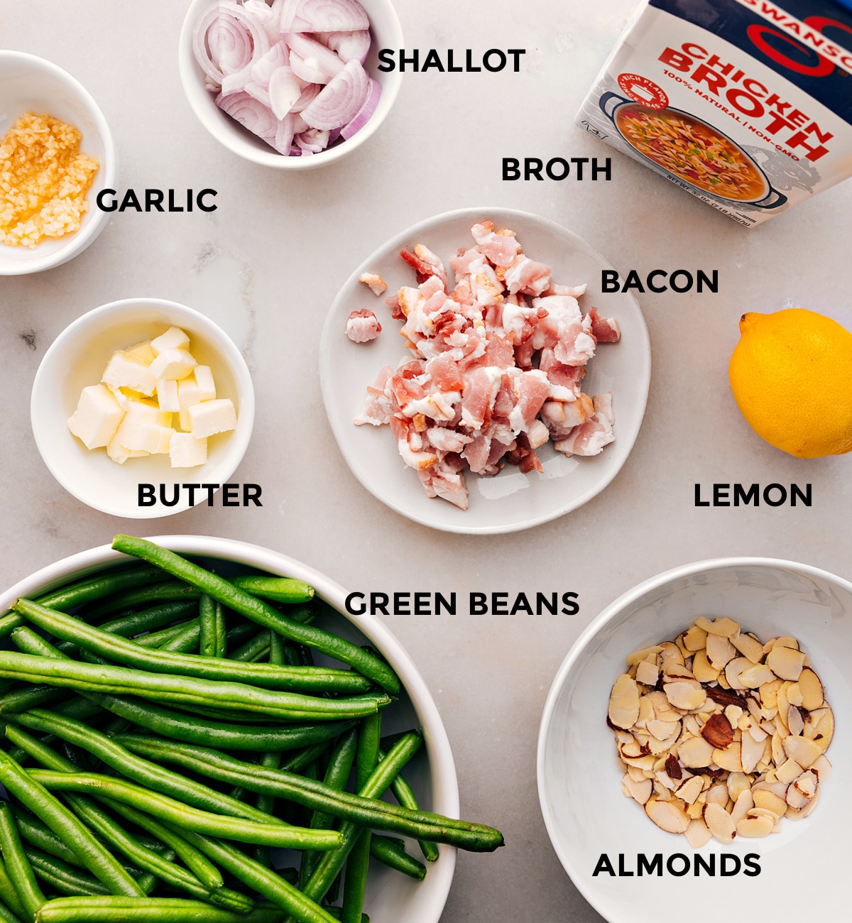 Ingredients Prepped For Green Beans With Bacon All the ingredients in this recipe—meat, veggies, butter, garlic, broth, lemon, and almonds—are prepped for easy assembly.