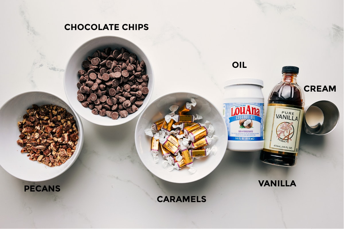 Ingredients In Turtle Bark All the ingredients in this recipe prepped for easy assembly including the pecans, chocolate chips, caramels, oil, vanilla, and cream.