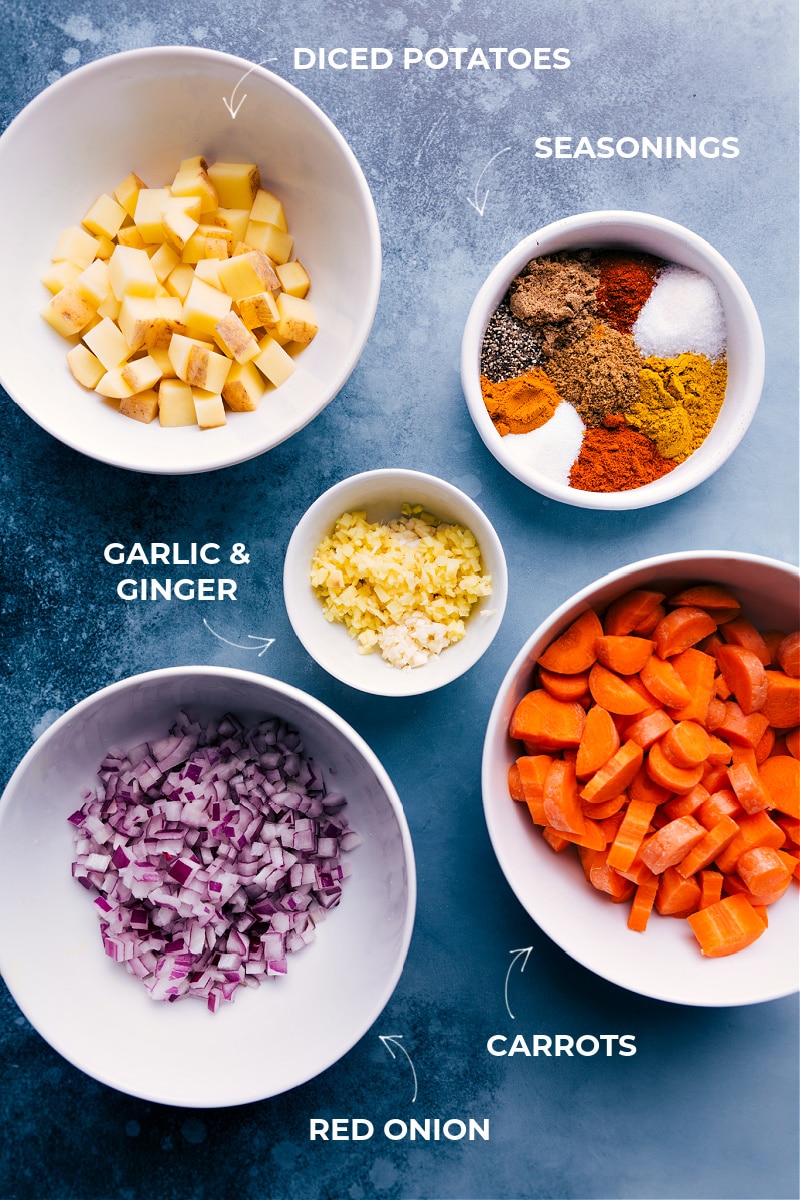 Curry Lentil Soup combines an array of veggies, red lentils, a robust seasoning blend, and creamy coconut milk to deliver an unforgettable warming meal. Recipe via ChelseasMessyApron #healthy #quick #easy #simple #protein #whole #whole30 #vegan #vegetarian #dinner #peas #curry #lentil #soup Ingredient shot for Curry Lentil Soup.