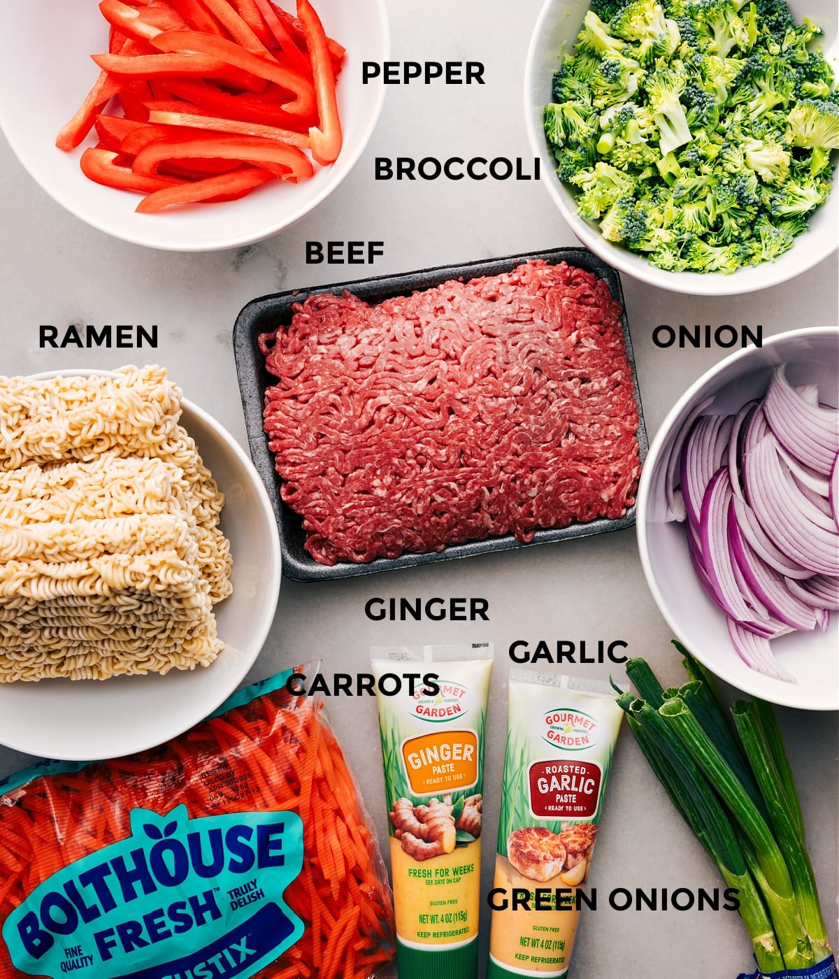 Ingredients In Ground Beef Ramen All the ingredients for this recipe are prepped and ready to goโpeppers, broccoli, meat, onion, noodles, ginger, garlic, green onions, and carrots.