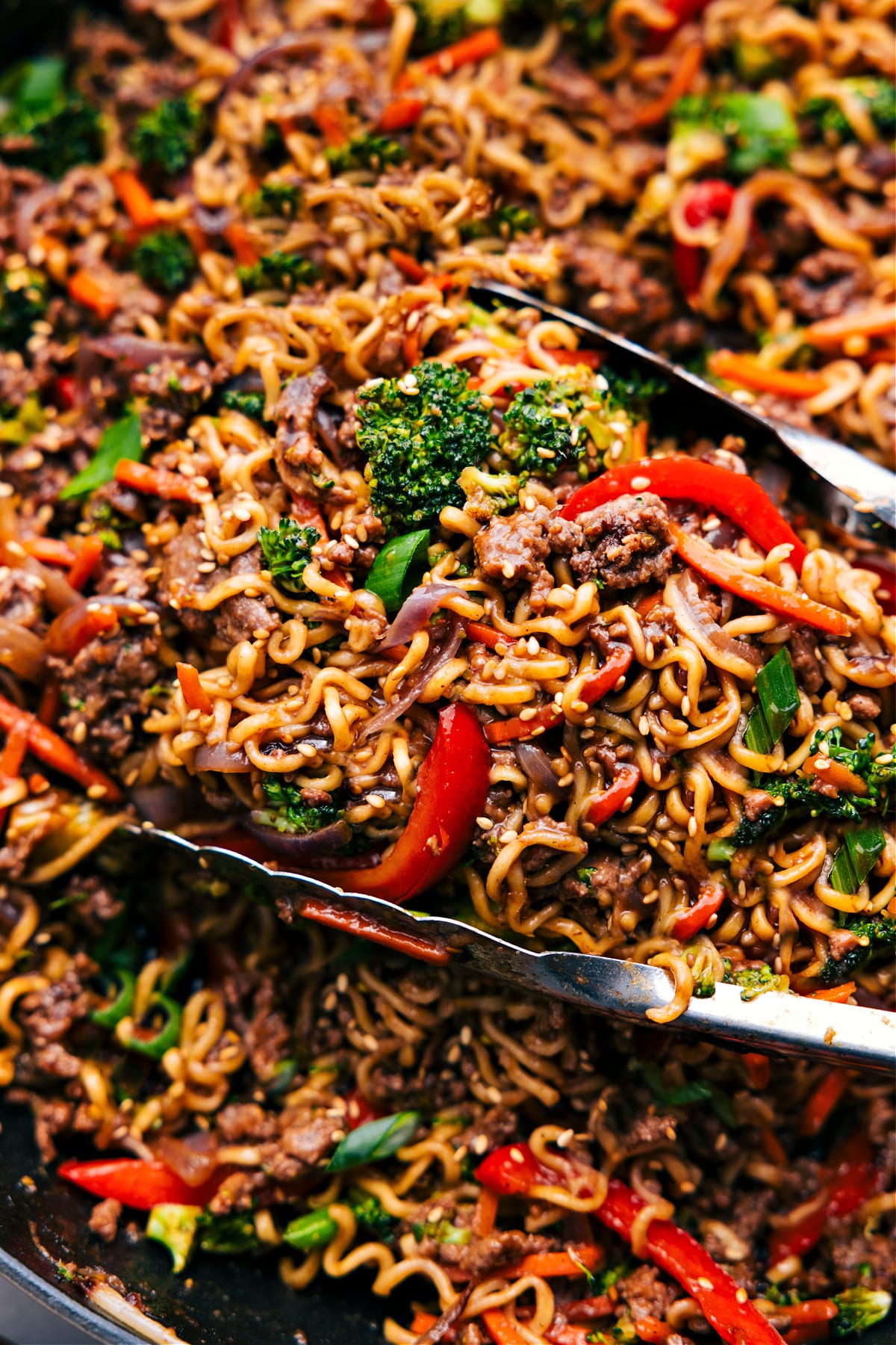 The Perfect Weeknight Dinner: Ground Beef Ramen Ground Beef Ramen in the skillet, ready to be served and enjoyed, topped with sesame seeds.