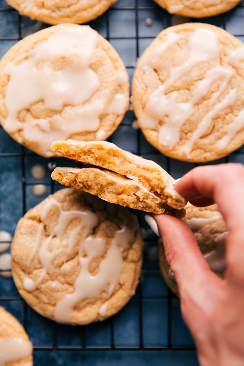 This maple cookies recipe on a cooling rack with glaze on top, ready to be enjoyed.