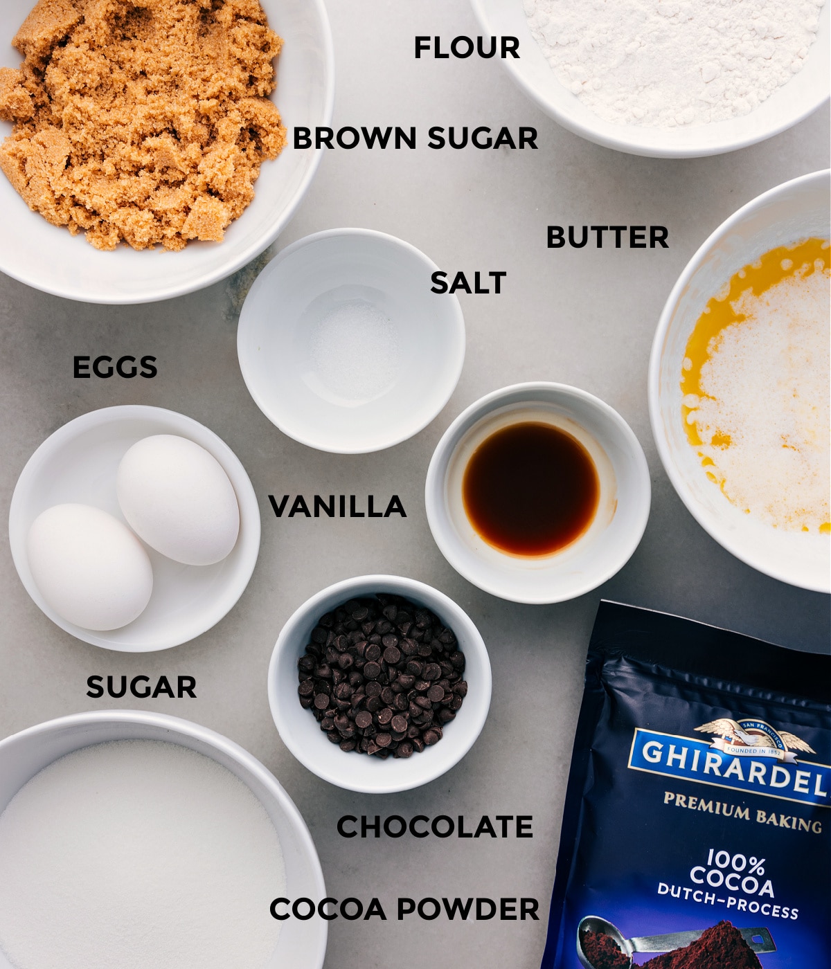 Ingredients In This Brownie Recipe All the ingredientsโbutter, salt, flour, eggs, vanilla, cocoa powder, chocolate, and sugarโare prepped for easy assembly.