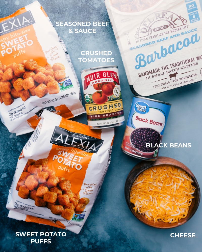 Deconstructed Beef Totchos are Tater Tot nachos dismantled into its component parts. This meal is made on one sheet pan with less than 10 ingredients! Recipe via ChelseasMessyApron #dinner #quick #easy #simple #best #30mins #avocado #cheese #tatertots #sweetpotato #deconstructed #beef #totchos Ingredient shot-- Image of all the ingredients used in this dish