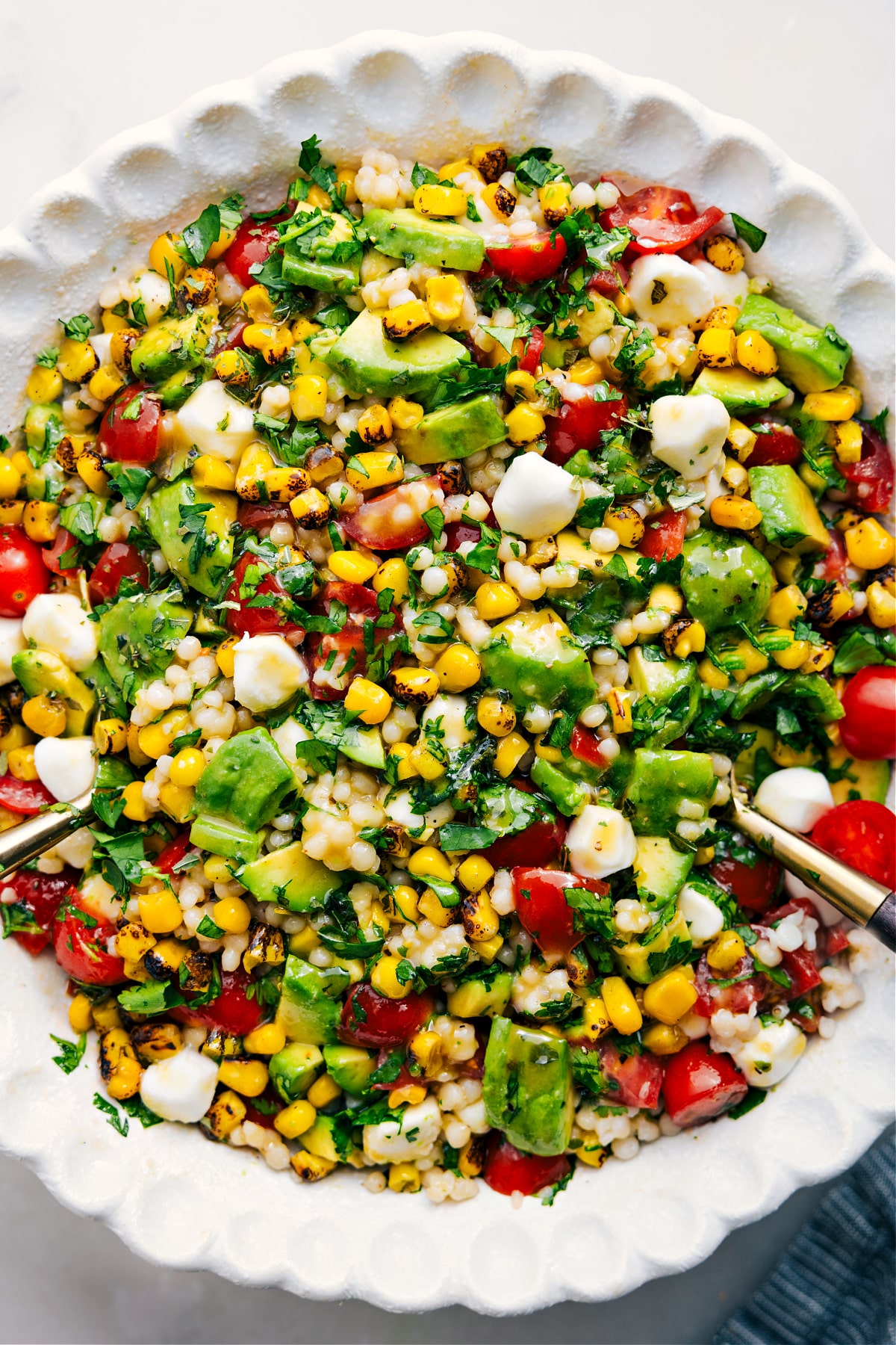 The Perfect Salad For The Summer A big, delicious, and flavorful salad in a bowl—dressed and ready to enjoy.