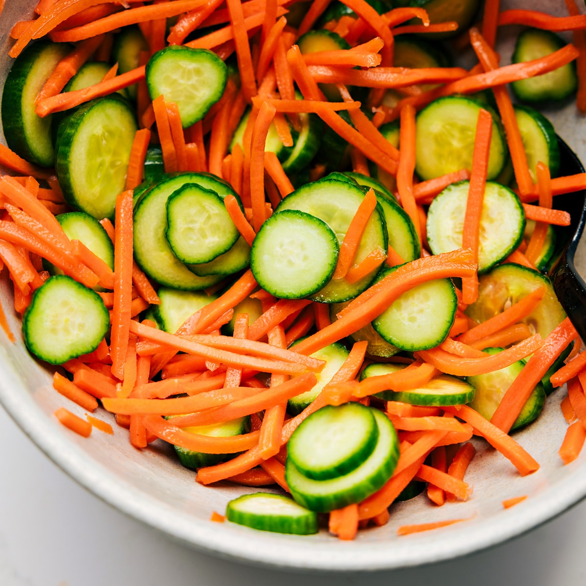 Serve Korean Ground Beef With A Cucumber Carrot Salad Quick cucumber and carrot salad mixed together in a bowl to serve with this Korean ground beef.