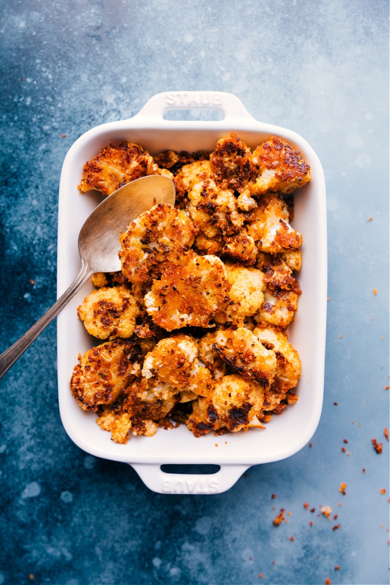 Roasted Cauliflower is the BEST way to enjoy this vegetable -- the high oven temperature yields beautiful caramelization with crisp edges and a tender interior. We have a basic, all-purpose Roasted Cauliflower recipe as well as a show-stopping Parmesan-breadcrumb-crusted version. Recipe via ChelseasMessyApron #side #thanksgiving #best #quick #easy #simple #healthy #cleaneating #snack #roasted #cauliflower Roasted Cauliflower