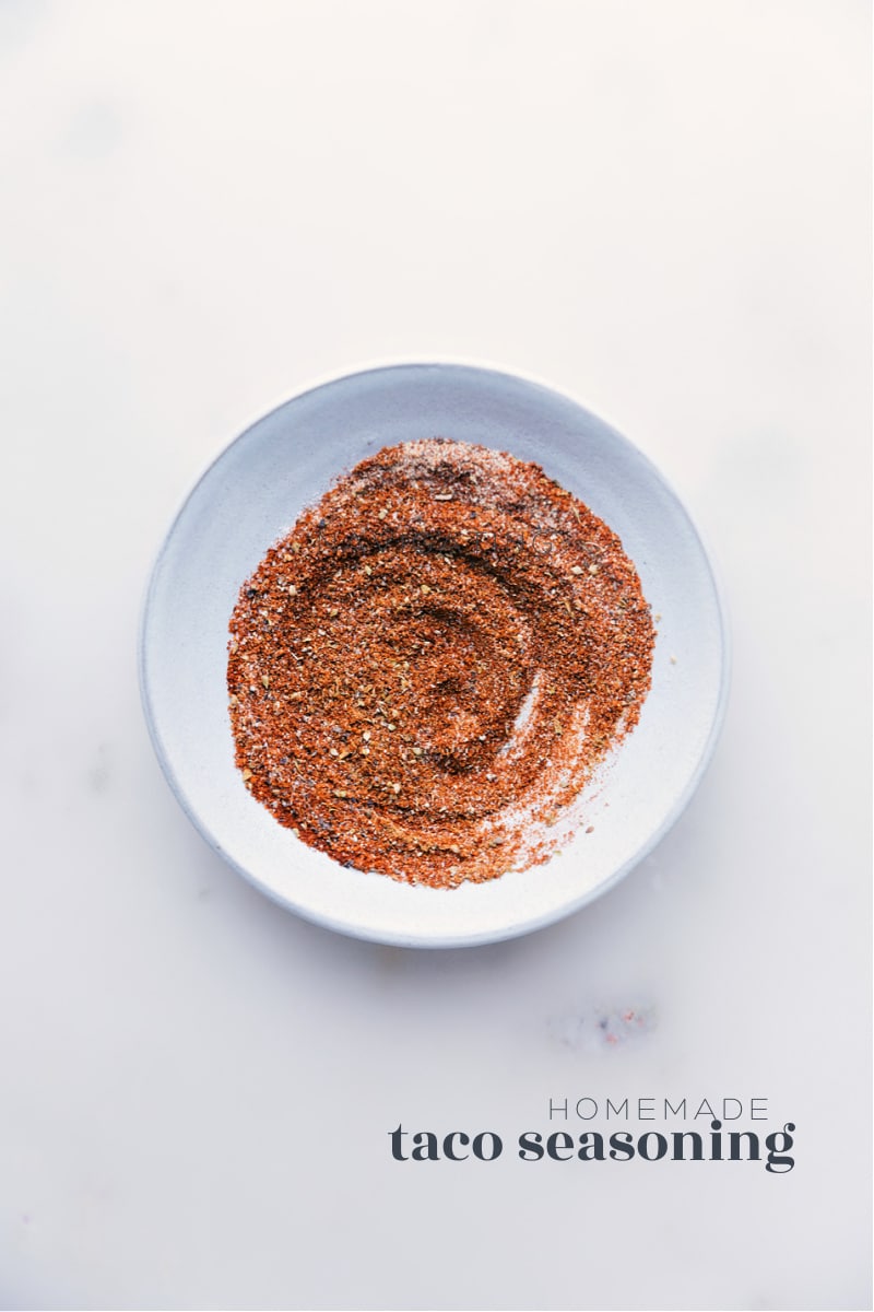 Our favorite Taco Seasoning blend is so simple to make and uses spices you probably already have in your cabinet! Ditch those store-bought packets--you'll never want to use them again after seeing how easy and tasty making your own Taco Seasoning can be! Recipe via ChelseasMessyApron #mexican #spices #best #quick #easy #simple #makeityourself #taco #seasoning Taco Seasoning in a bowl