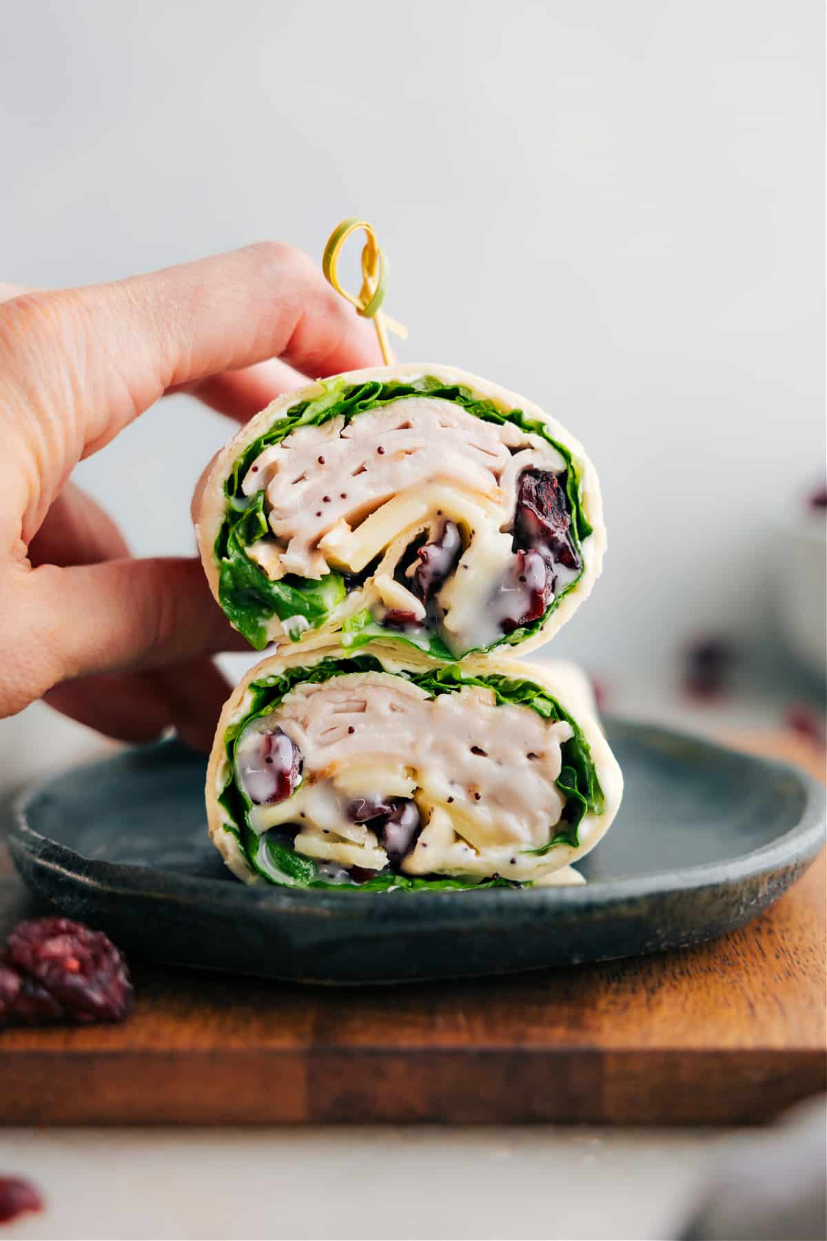Delicious Turkey Cranberry Wraps The turkey cranberry wraps stacked on top of each other ready to be enjoyed.