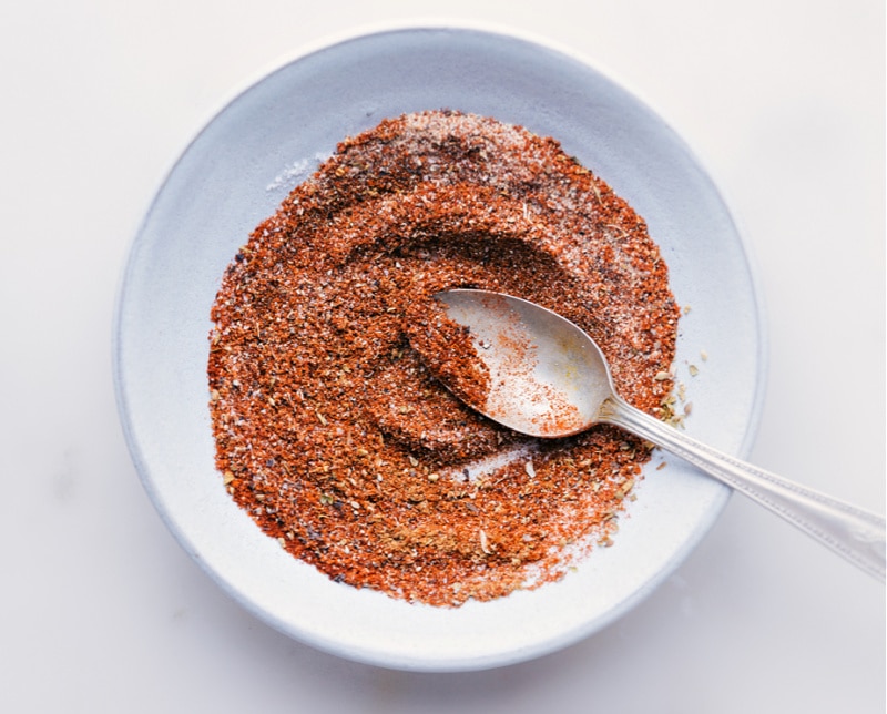 Our favorite Taco Seasoning blend is so simple to make and uses spices you probably already have in your cabinet! Ditch those store-bought packets, you'll never want to use them again after seeing how easy it can be! Recipe via ChelseasMessyApron #mexican #spices #best #quick #easy #simple #makeityourself #taco #seasoning Overhead image of Taco Seasoning all mixed together