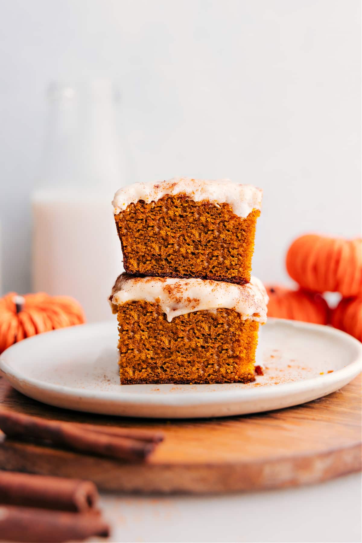 Pumpkin Bars Stacked On Top Of Each Other Pumpkin Bars stacked on top of each other.