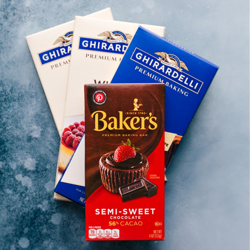 Peppermint Bark recipe complete with 3 types of chocolate and crushed peppermint -- do holiday treats get any better than this?! Recipe via ChelseasMessyApron #dessert #best #quick #easy #simple #christmas #holidays #peppermint #bark Ingredient shot-- images of the chocolate bars used in this recipe