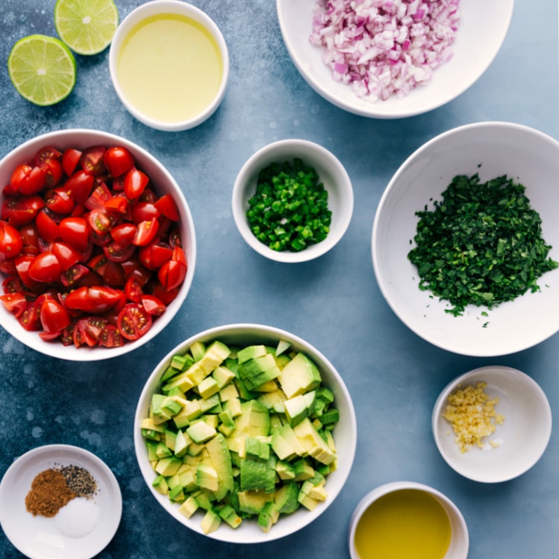 This Avocado Salsa is our favorite! Recipe via ChelseasMessyApron #sidedish #dip #best #quick #easy #simple #snack #gameday #chips #avocado #salsa Ingredient shot-- image of all the ingredients used in this dish