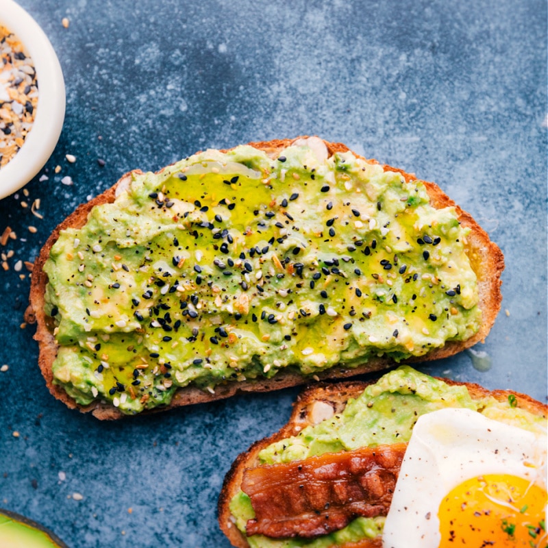 The best Avocado Toast recipes ever -- five different ways to make this nutritious, filling, and tasty breakfast, snack, or lunch. After 5+ years of regularly enjoying Avo Toast, I've narrowed down my family's top favorites and am sharing it all here. Recipe via ChelseasMessyApron #breakfast #quick #easy #simple #healthy #delicious #clean #cleaneating #whole #avocado #toast Overhead image of the Everything Bagel Avocado Toast
