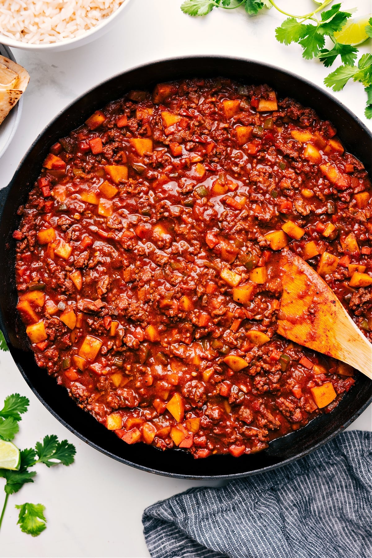 Mexican Picadillo in a skillet, ready to be served and enjoyed.