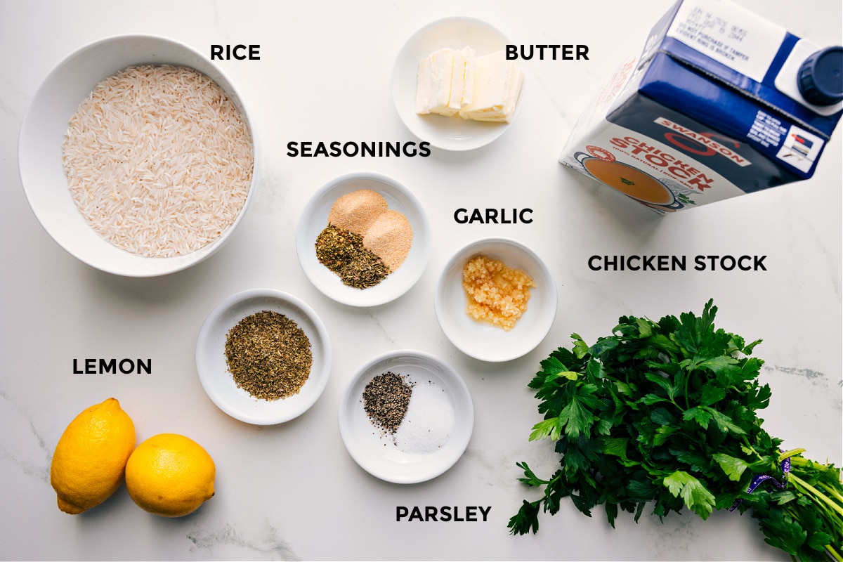 Ingredients In Lemon Rice Recipe All the ingredients in this recipe prepped out for easy assembly including the rice, seasonings, lemon, garlic, butter, parsley, and chicken stock.