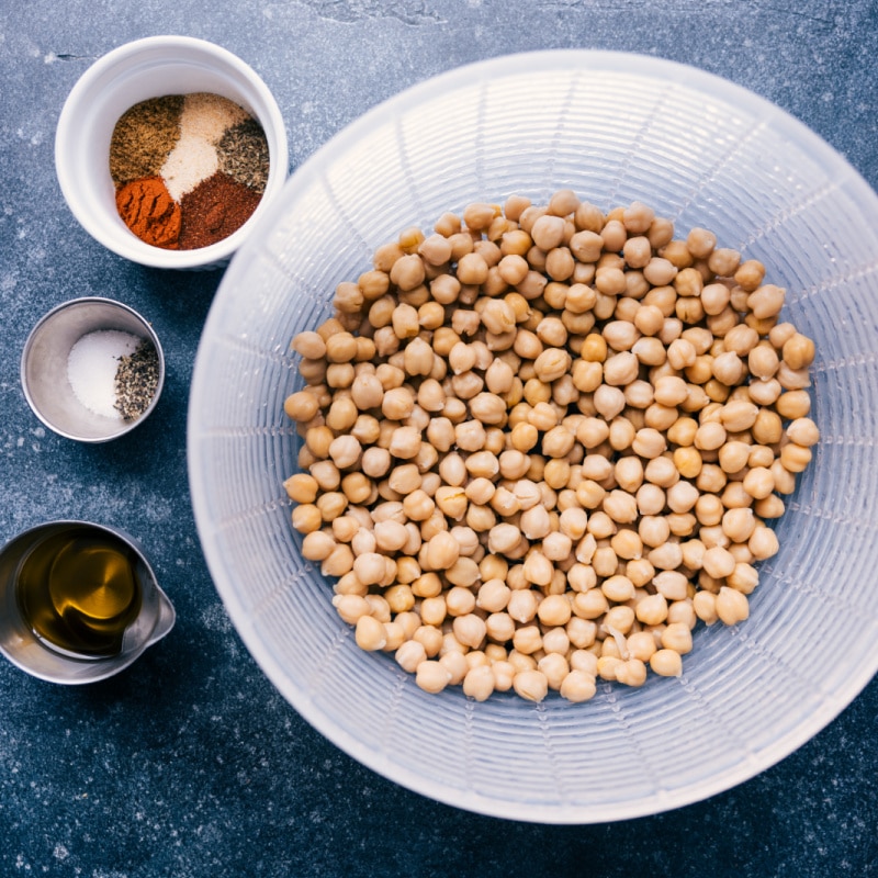 These Air Fryer Chickpeas are abundantly seasoned with a delicious savory flavor! Recipe via ChelseasMessyApron #sidedish #best #quick #easy #simple #snacks #paleo #glutenfree #dairyfree #familyfriendly #airfryer #chickpeas Process shots-- images of all the ingredients used in this recipe