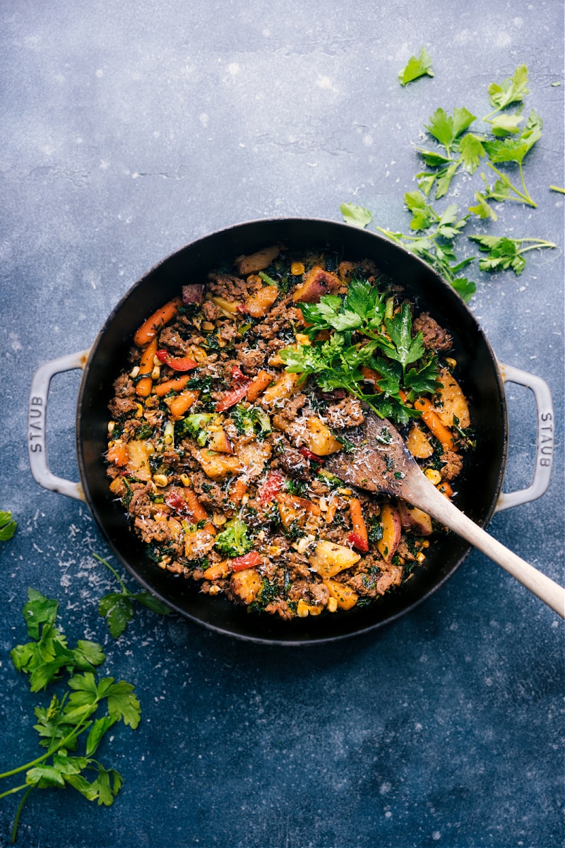 This Sausage And Veggie Skillet is unbelievably easy (thanks to frozen veggies) while being loaded with flavor (thanks to an incredible spice blend)! Recipe via ChelseasMessyApron.com #sausageskillet #quickeasy #backtoschool #lifesaver #veggies View of Sausage and Veggie Skillet, still in the pan